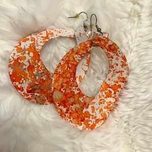 Metal orange hoop earrings